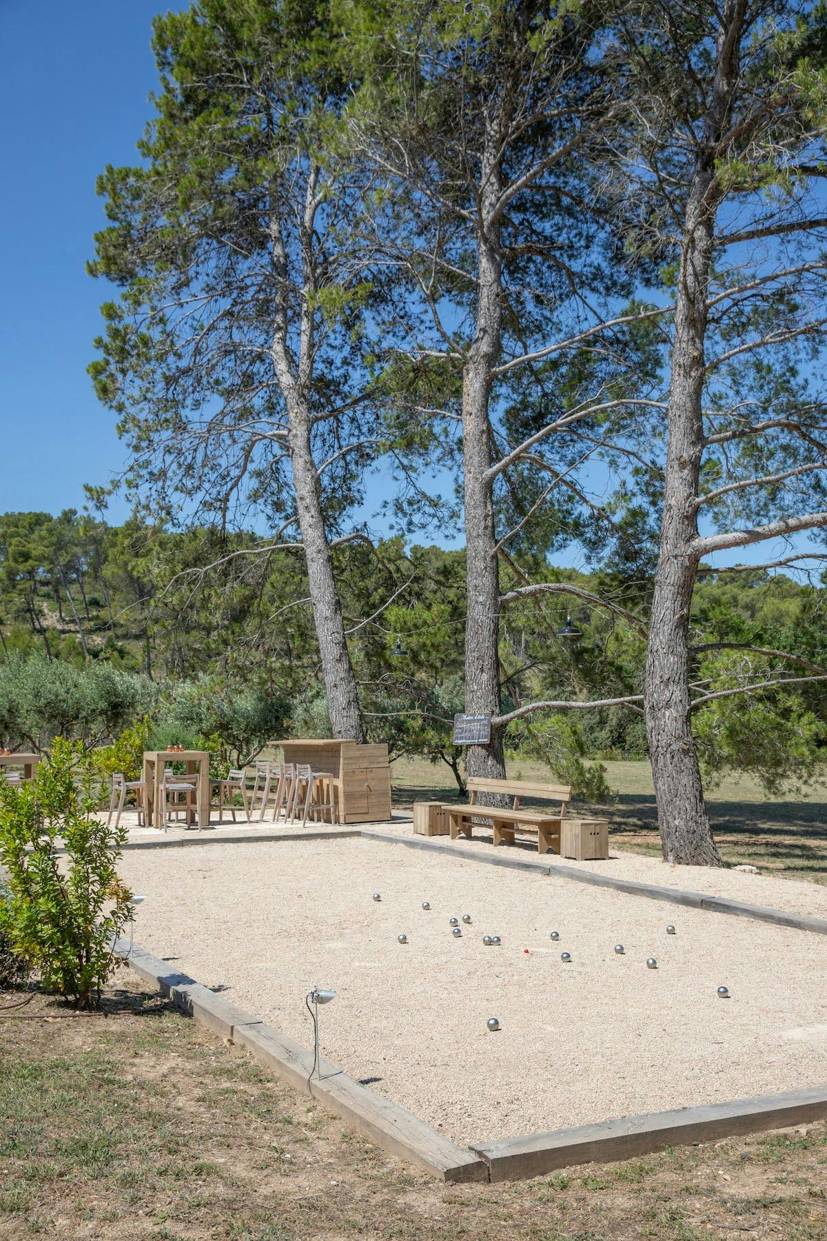 Petanque court surrounded by trees