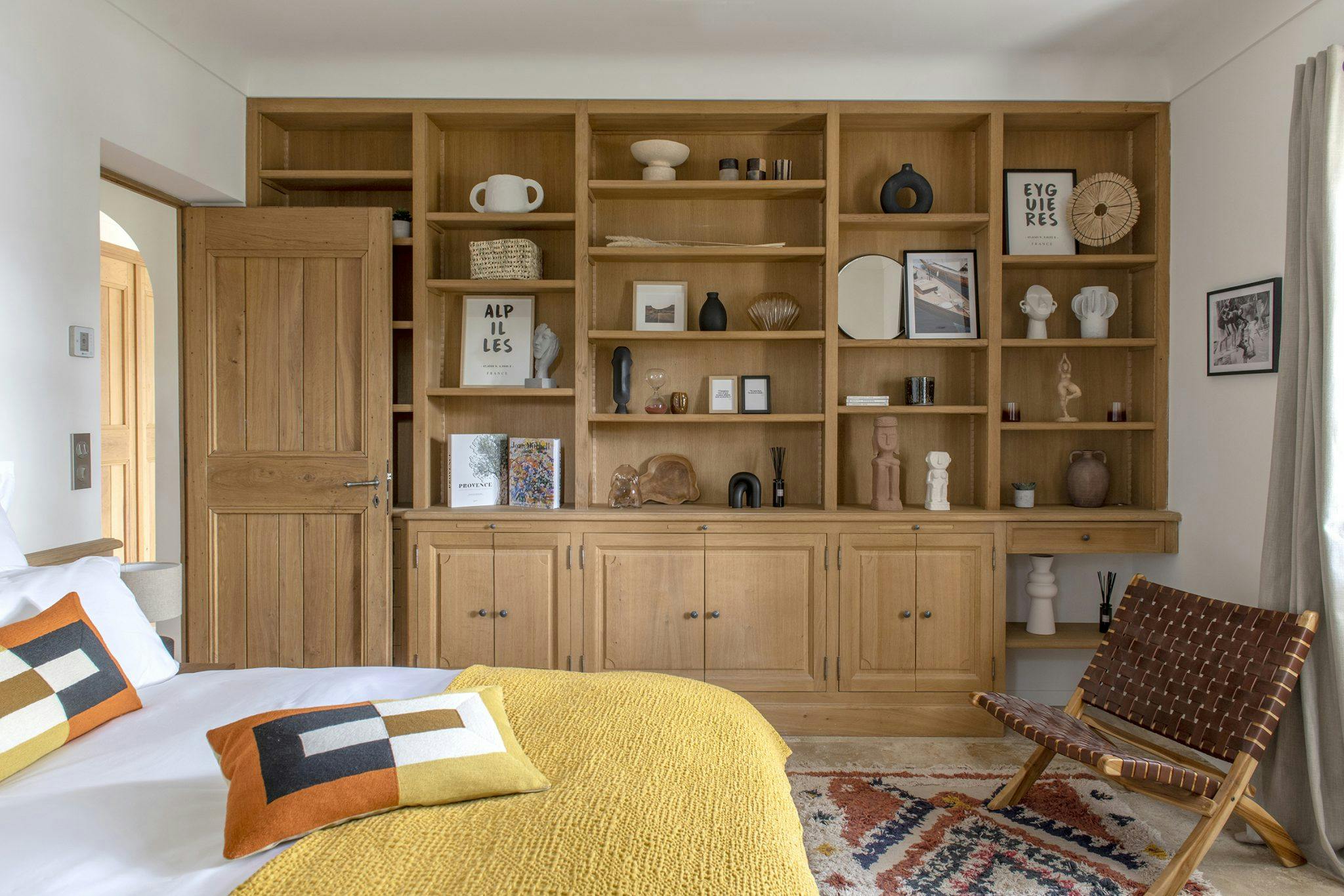 Bedroom with wooden shelf
