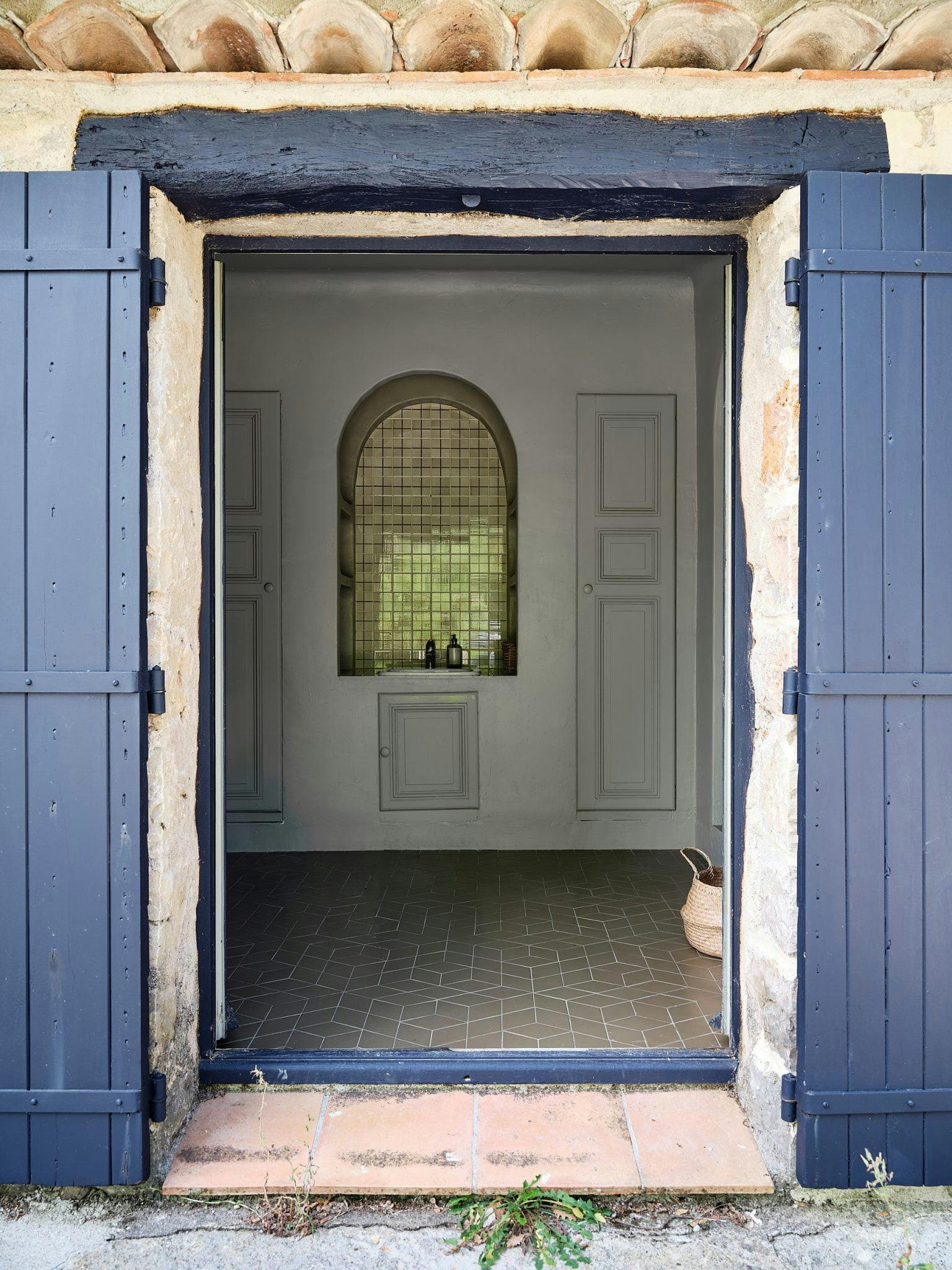 entrance to the pavilion, blue wooden door