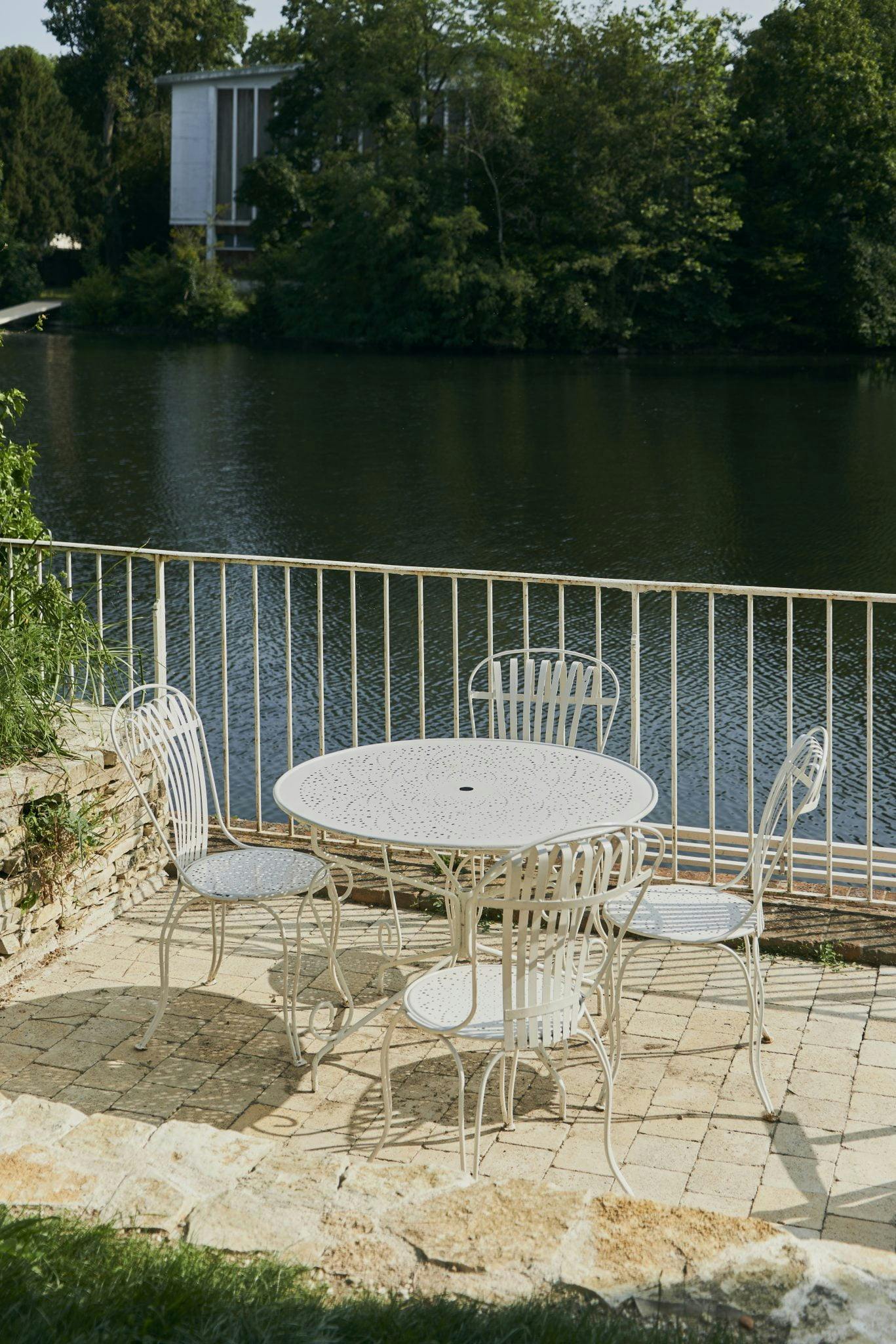 table for coffee in the sun by the lake