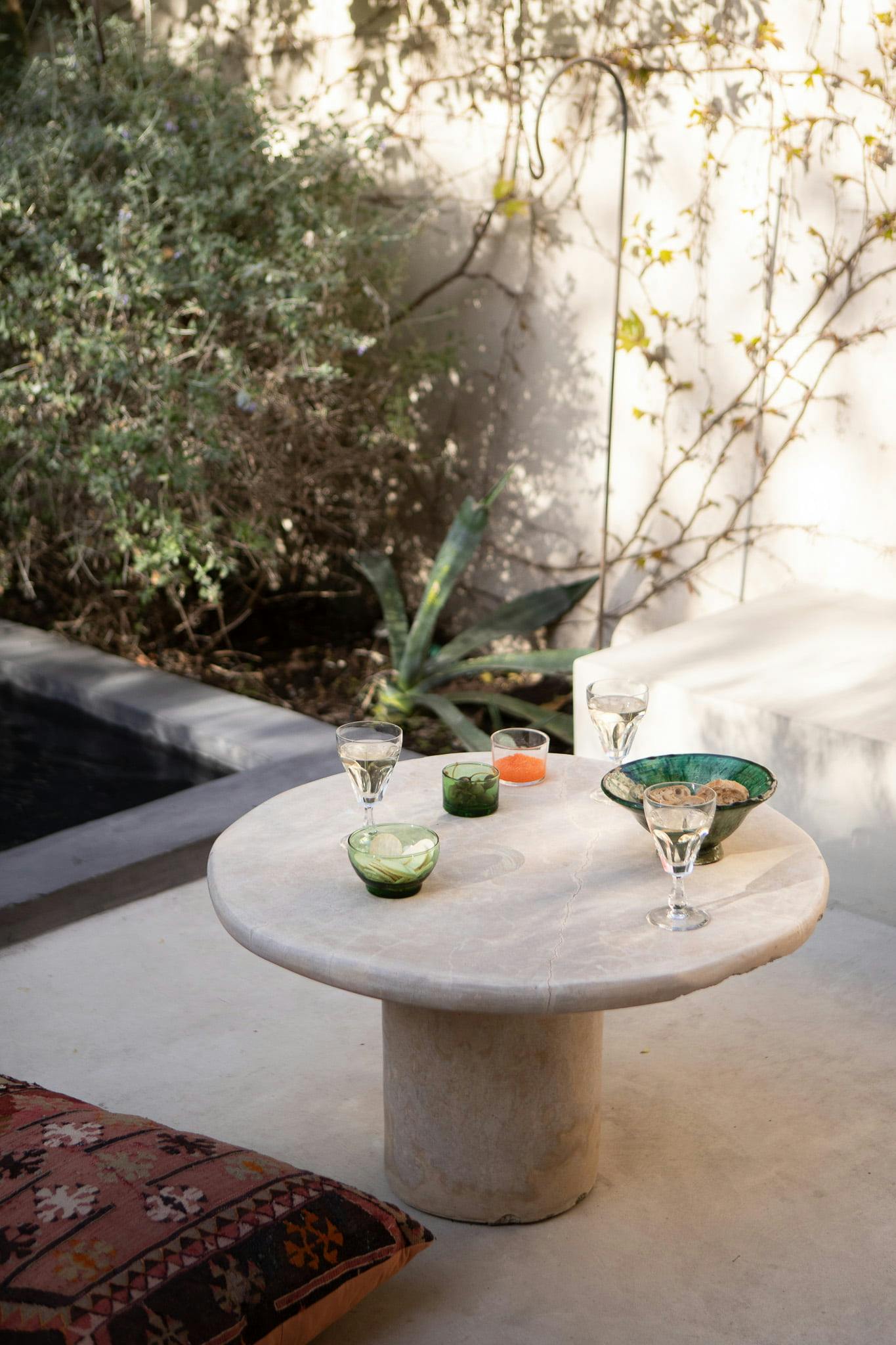 terrace decoration: coffee table and cocktail glass