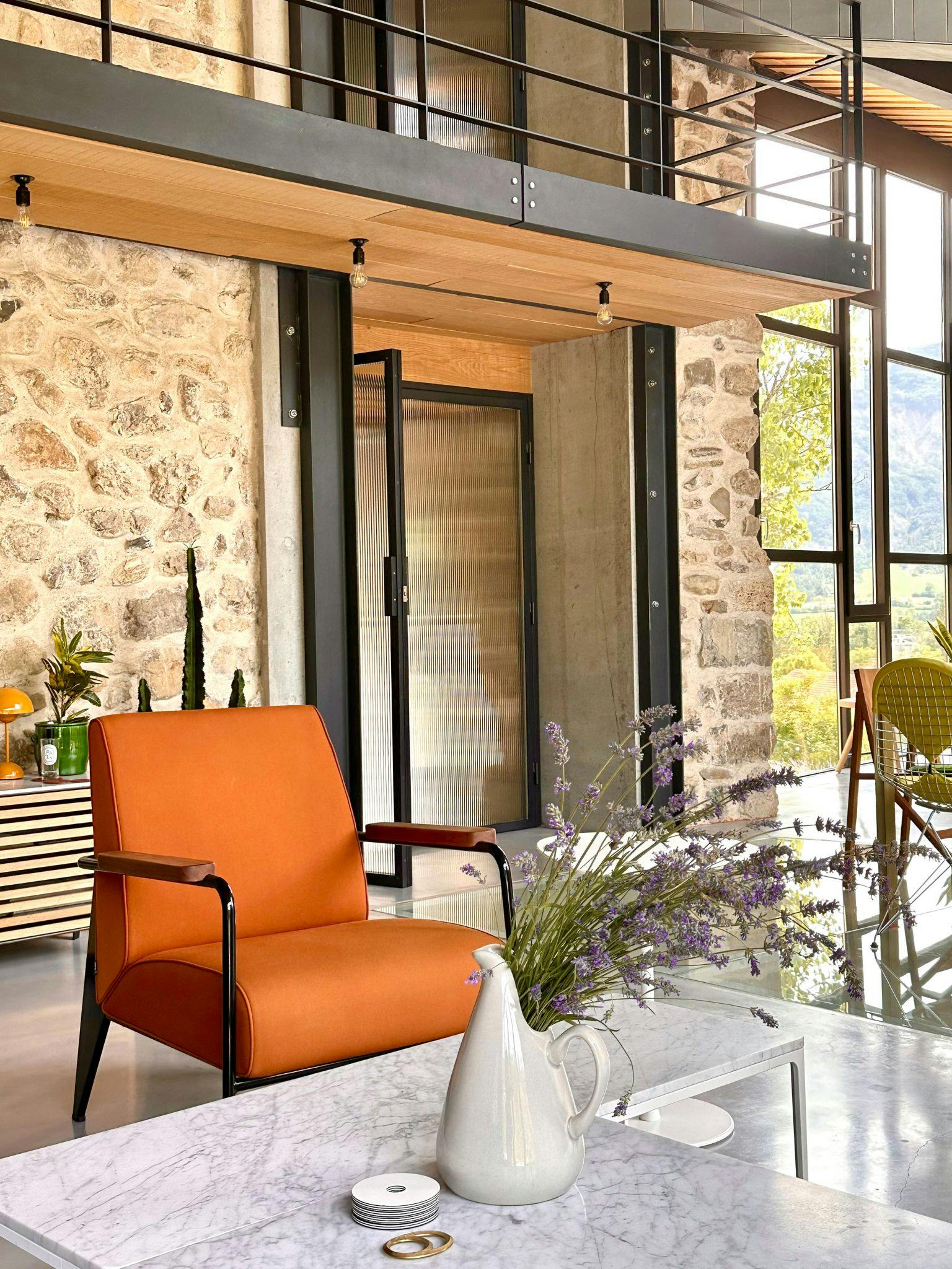 Design furniture and traditional stone walls.