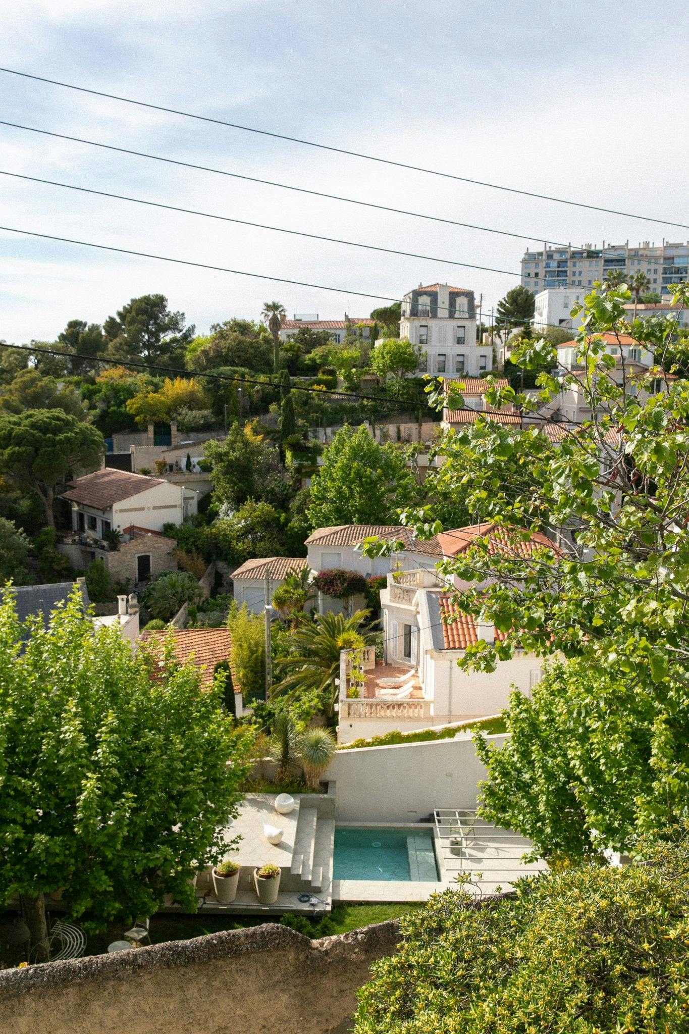 On one side the sea, on the other the lush gardens and rooftops of Marseille.