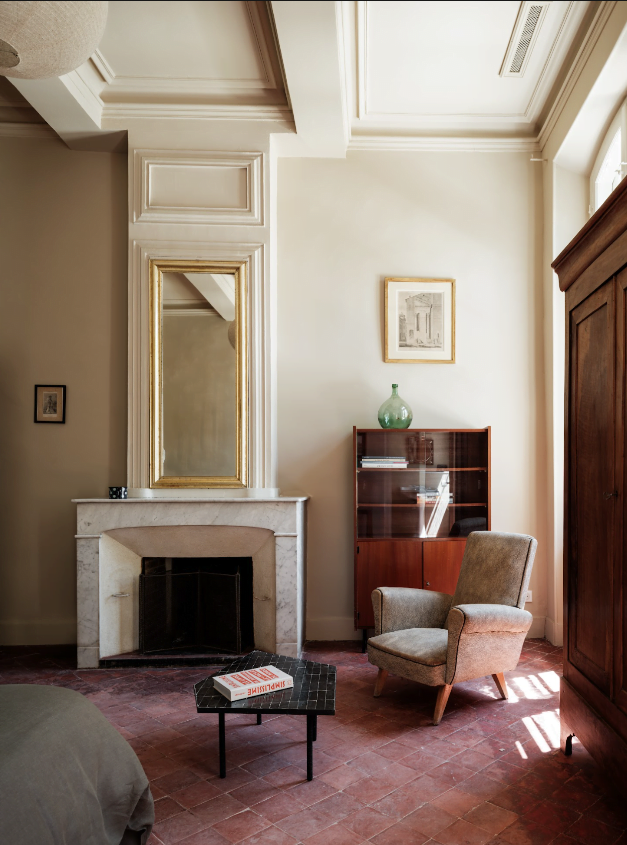 Small living room: fireplace, armchair, coffee table