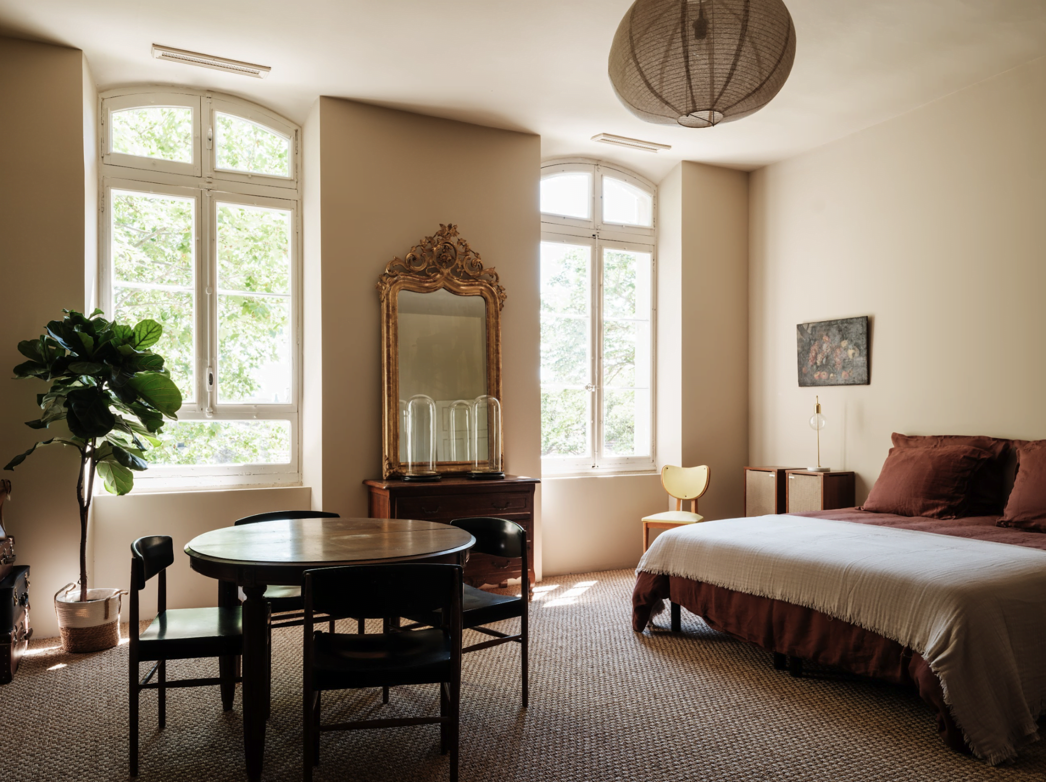 Bedroom: double bed, mirror, wooden table and chairs