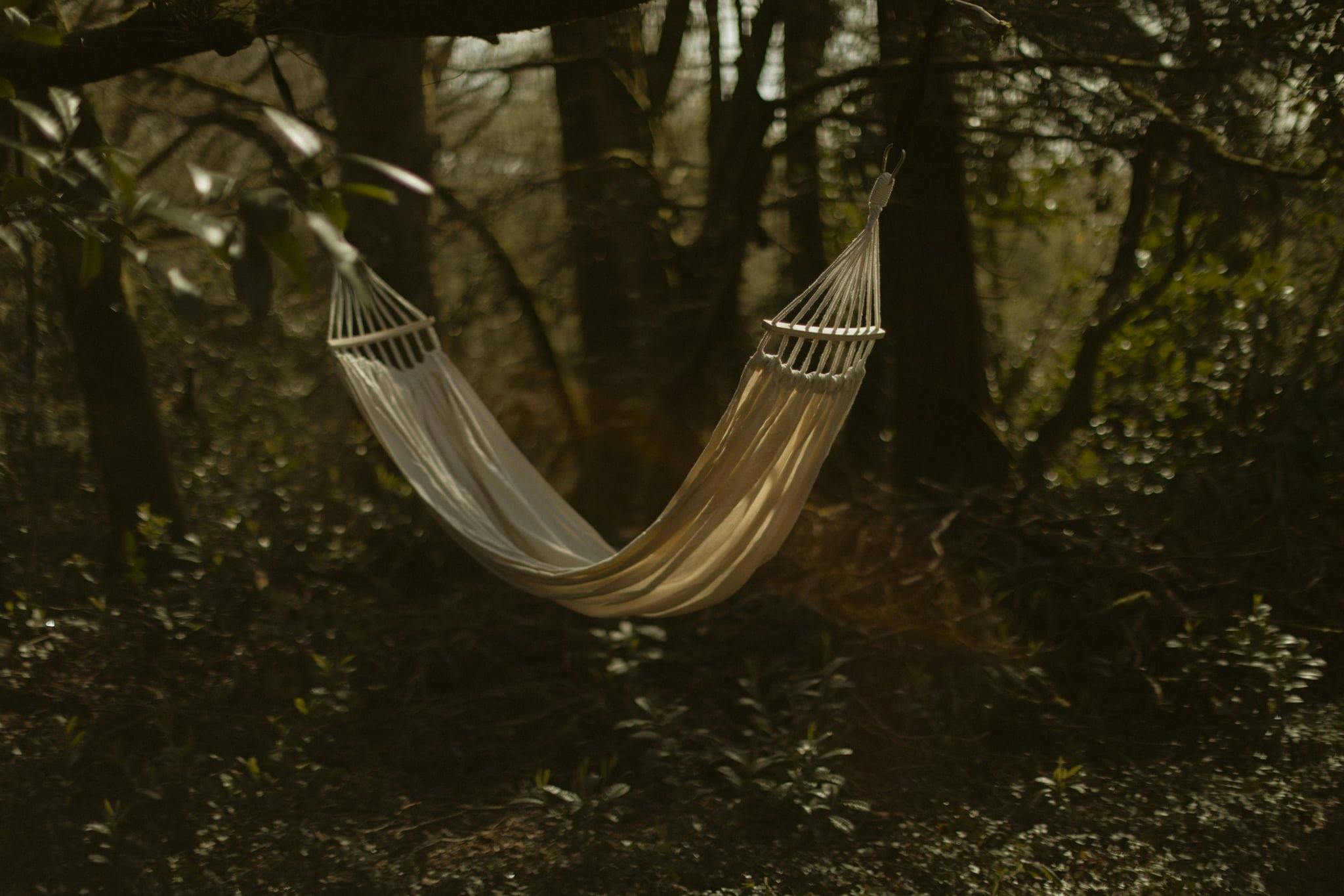 White hammock among the trees