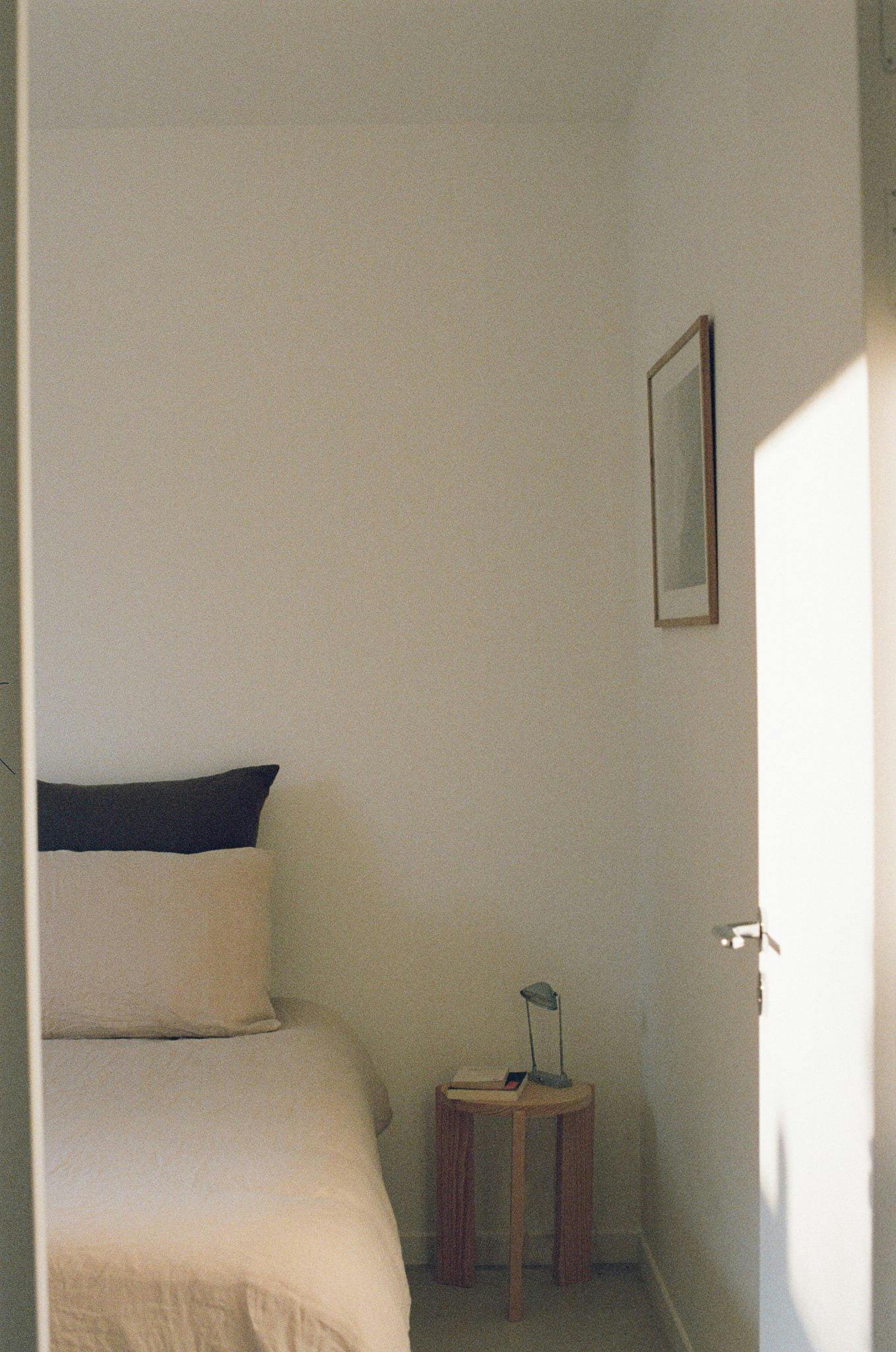 The bedroom: double bed, nightstand