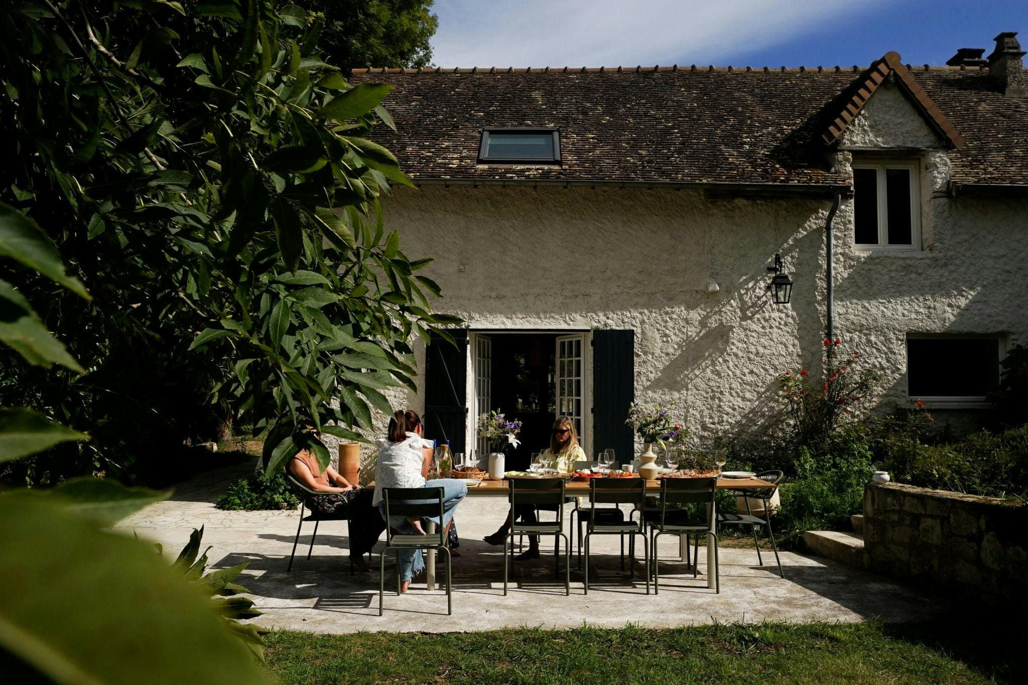 On the large terrace, where one can enjoy endless views of the fields.