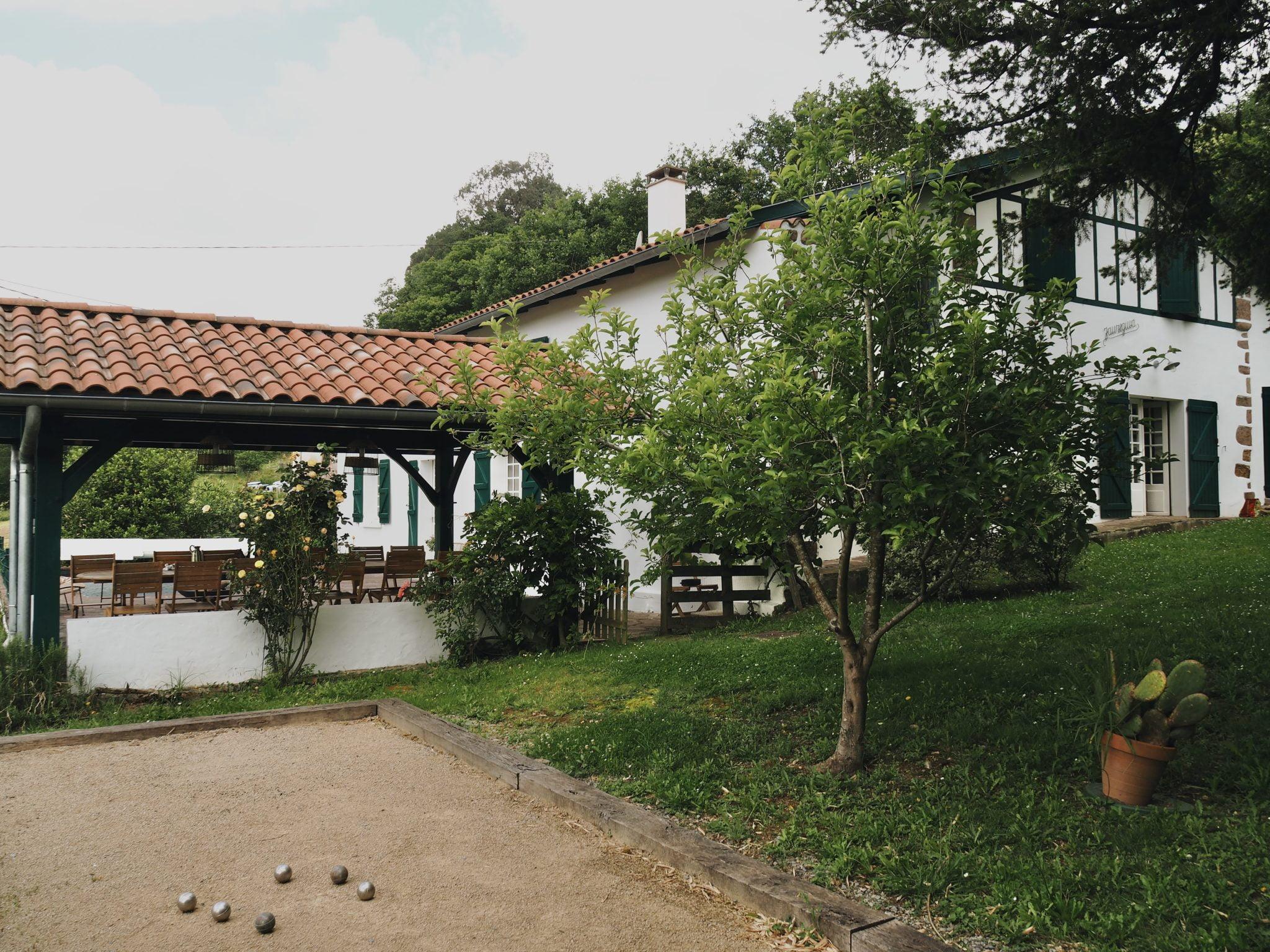 Lime-washed white walls and green half-timbering—welcome to the Basque Country!