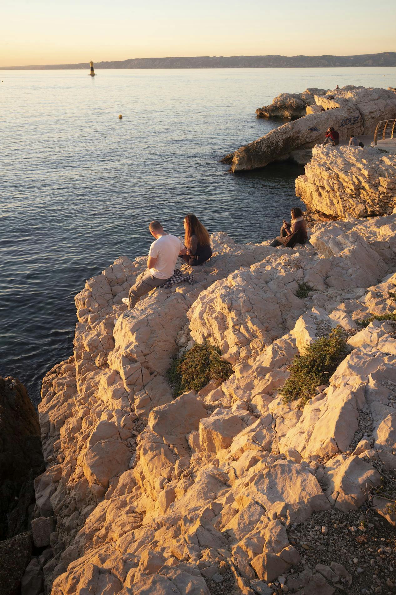 Settled comfortably on the rocks, just like the locals.