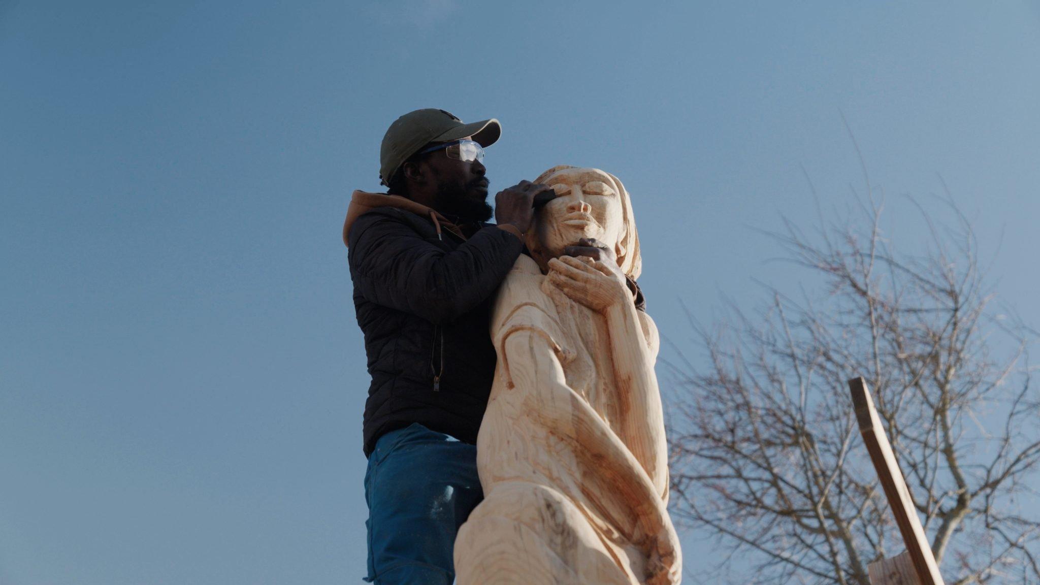 Sculptor Armand Kebfoube at work. 