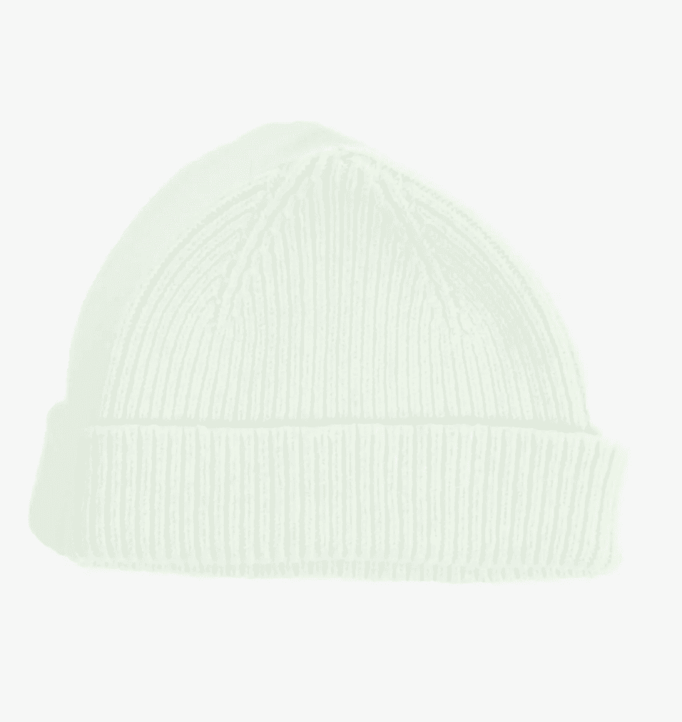 A light green knitted beanie with ribbed texture and a folded brim.