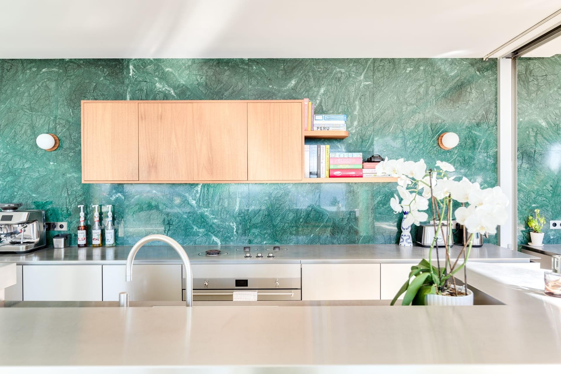 The stunning green marble kitchen of Villa Sunset.
