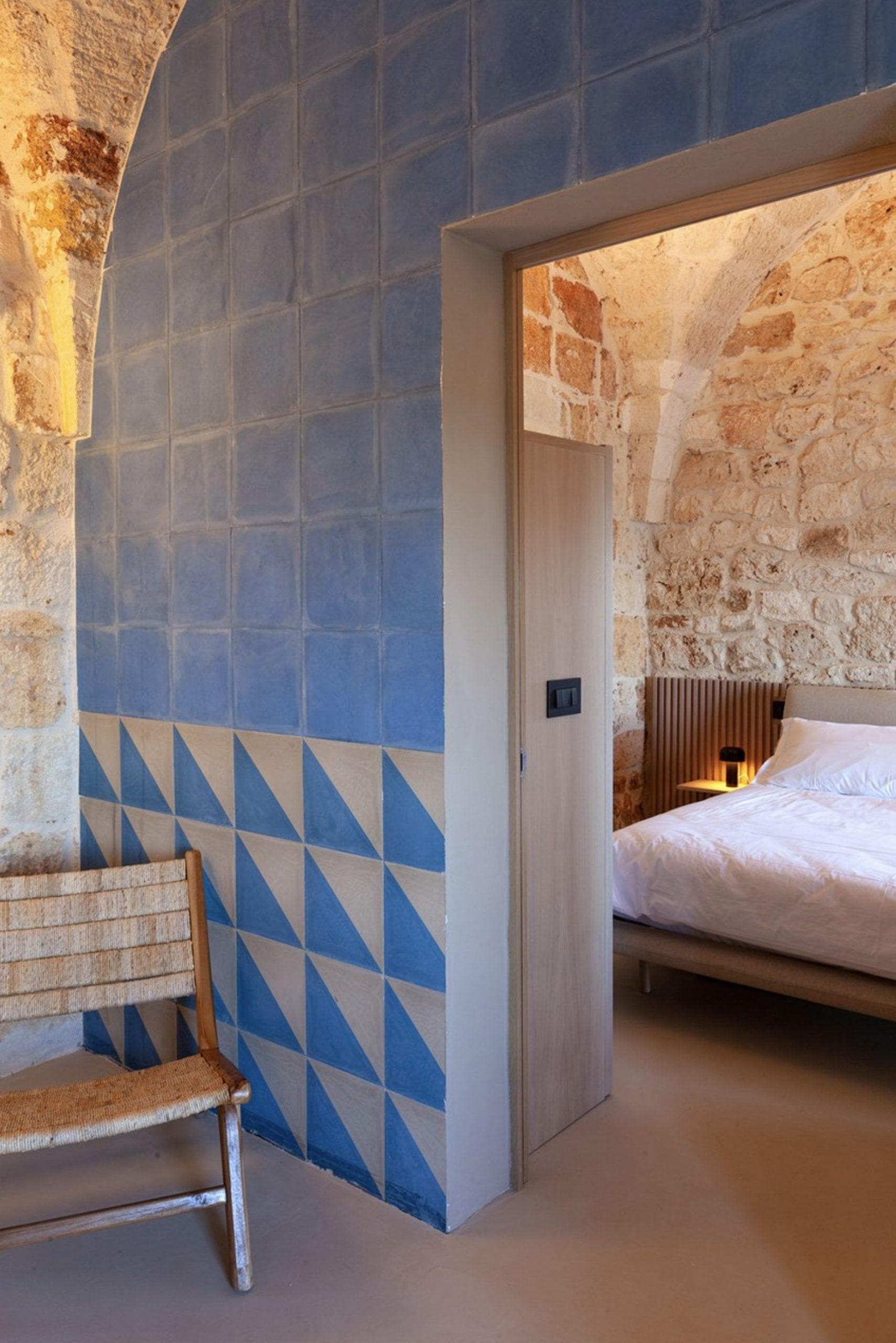 Local tiles blend with the original stone.