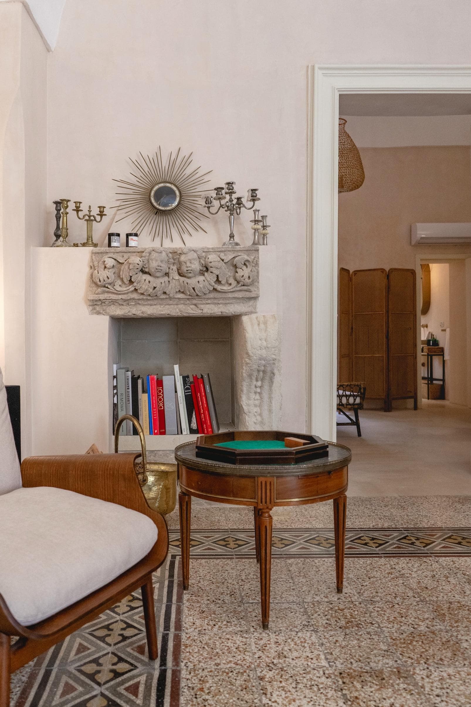 The living room where centuries-old stone meets vintage furniture.
